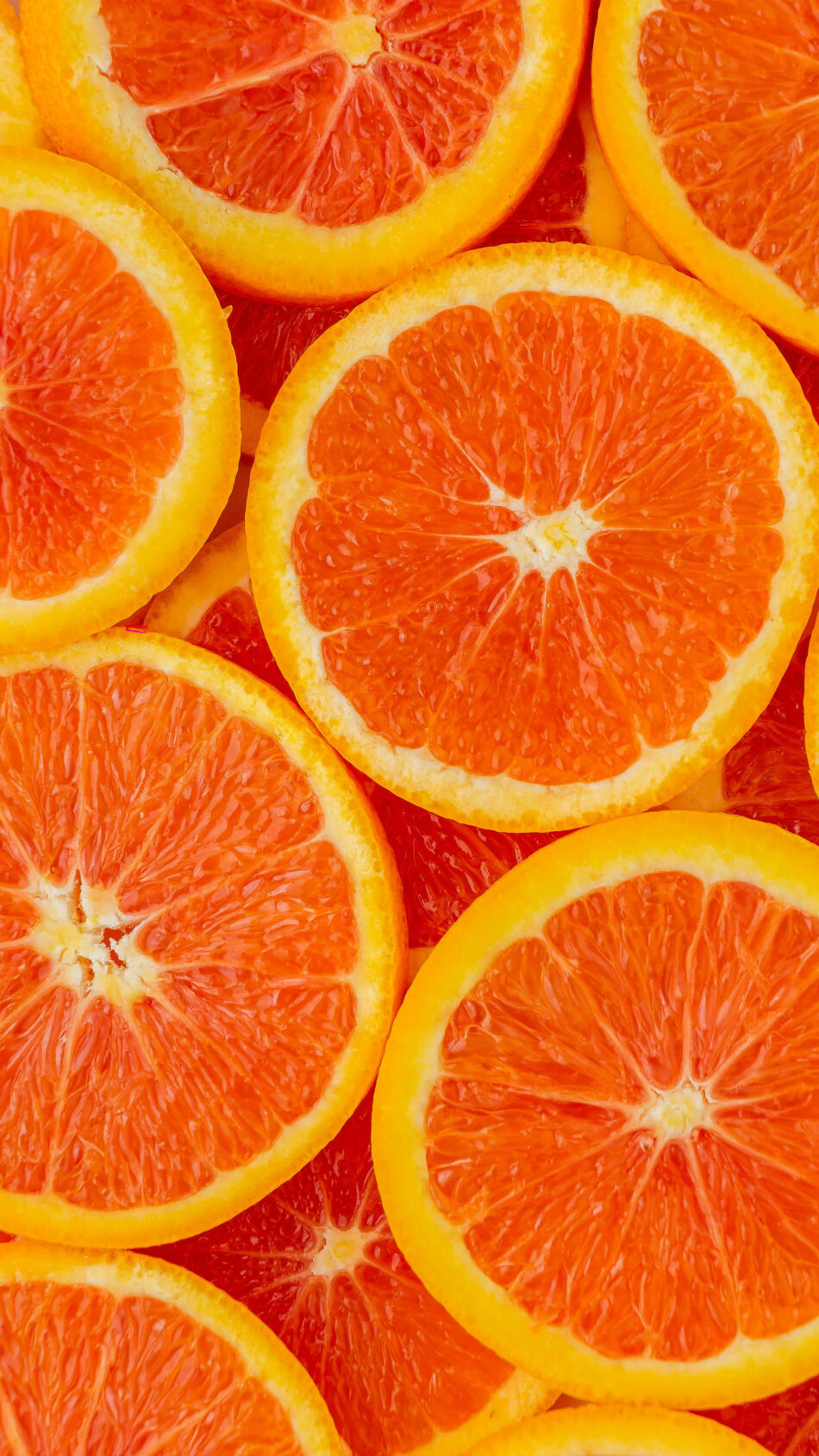 Half Slice of Oranges 4K Ultra HD Mobile Wallpaper