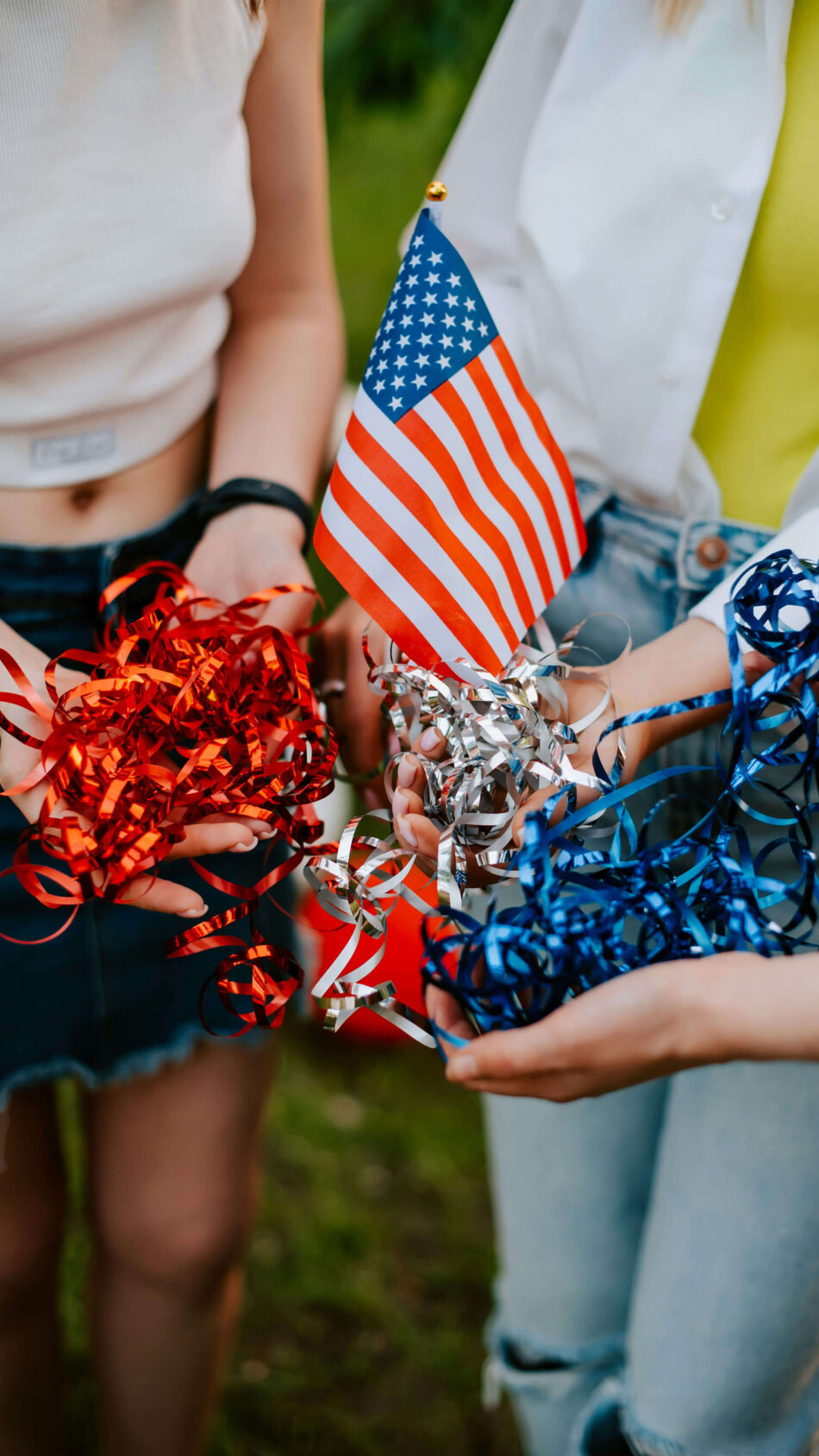 Girls Holding American Flag And Streamers 4K Ultra HD Mobile Wallpaper