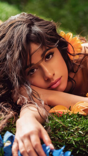 Camila Cabello Lying On Grass And Flowers 4k Ultra HD Mobile Phone Wallpaper