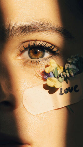 Girl Eye Love Bandage Flowers On Face 4K Ultra HD Mobile Phone Wallpaper